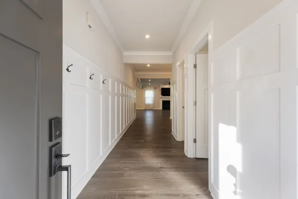 a view of entryway with wooden floor