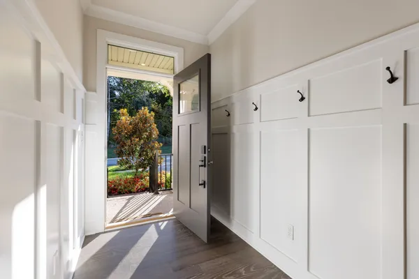 a bathroom with a sink toilet vanity and shower