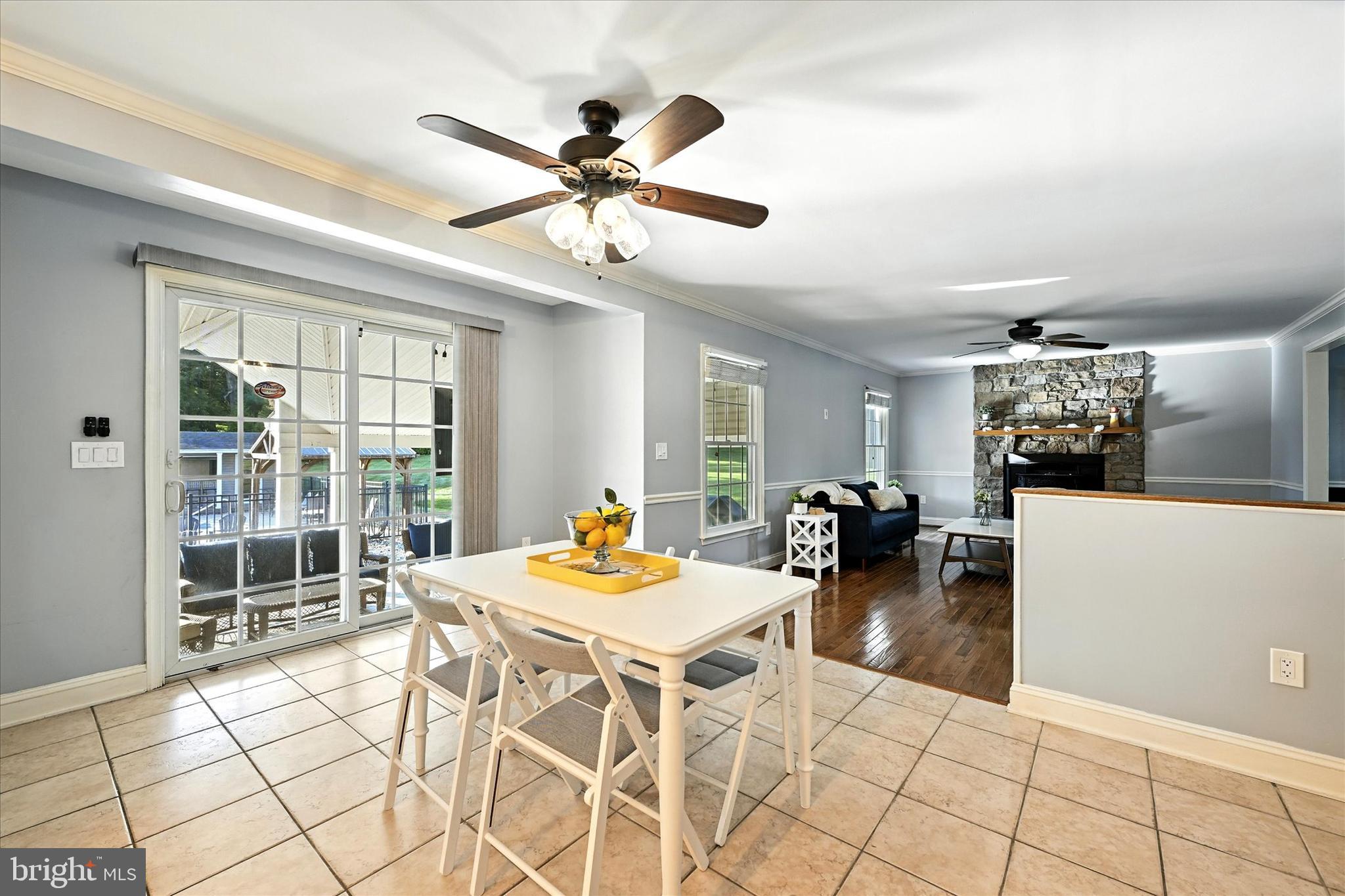 1014 Bernoudy Road White Hall, MD 21161 - Photo 19 of 73 a view of a dining room with furniture and chandelier
