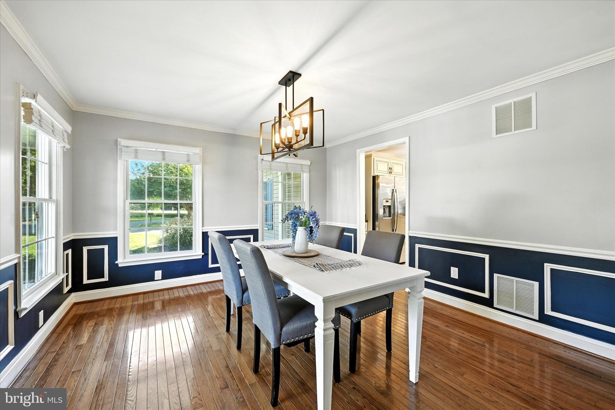 1014 Bernoudy Road White Hall, MD 21161 - Photo 29 of 73 a view of a dining room with furniture window and wooden floor