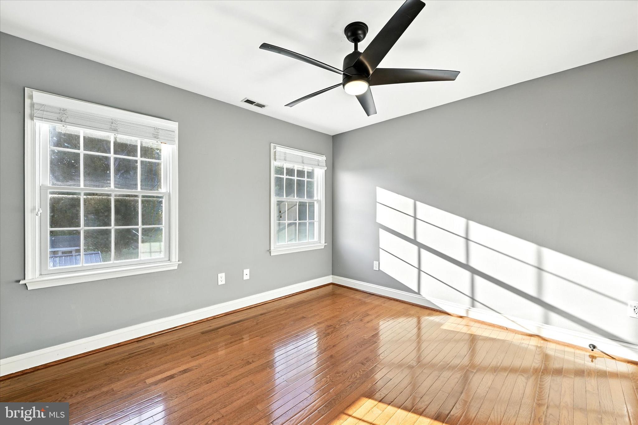 1014 Bernoudy Road White Hall, MD 21161 - Photo 37 of 73 a view of empty room with wooden floor and fan