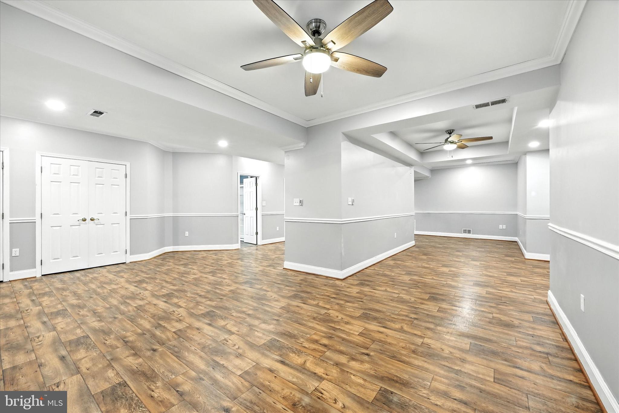 1014 Bernoudy Road White Hall, MD 21161 - Photo 45 of 73 a view of empty room with wooden floor and fan