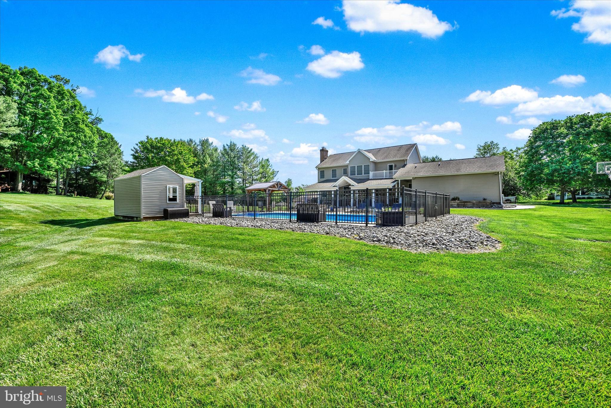 1014 Bernoudy Road White Hall, MD 21161 - Photo 49 of 73 a view of a house with a big yard and large trees