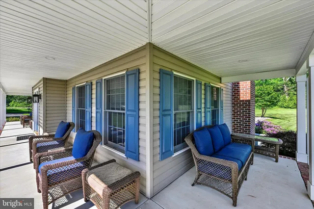a view of a swimming pool with lounge chair