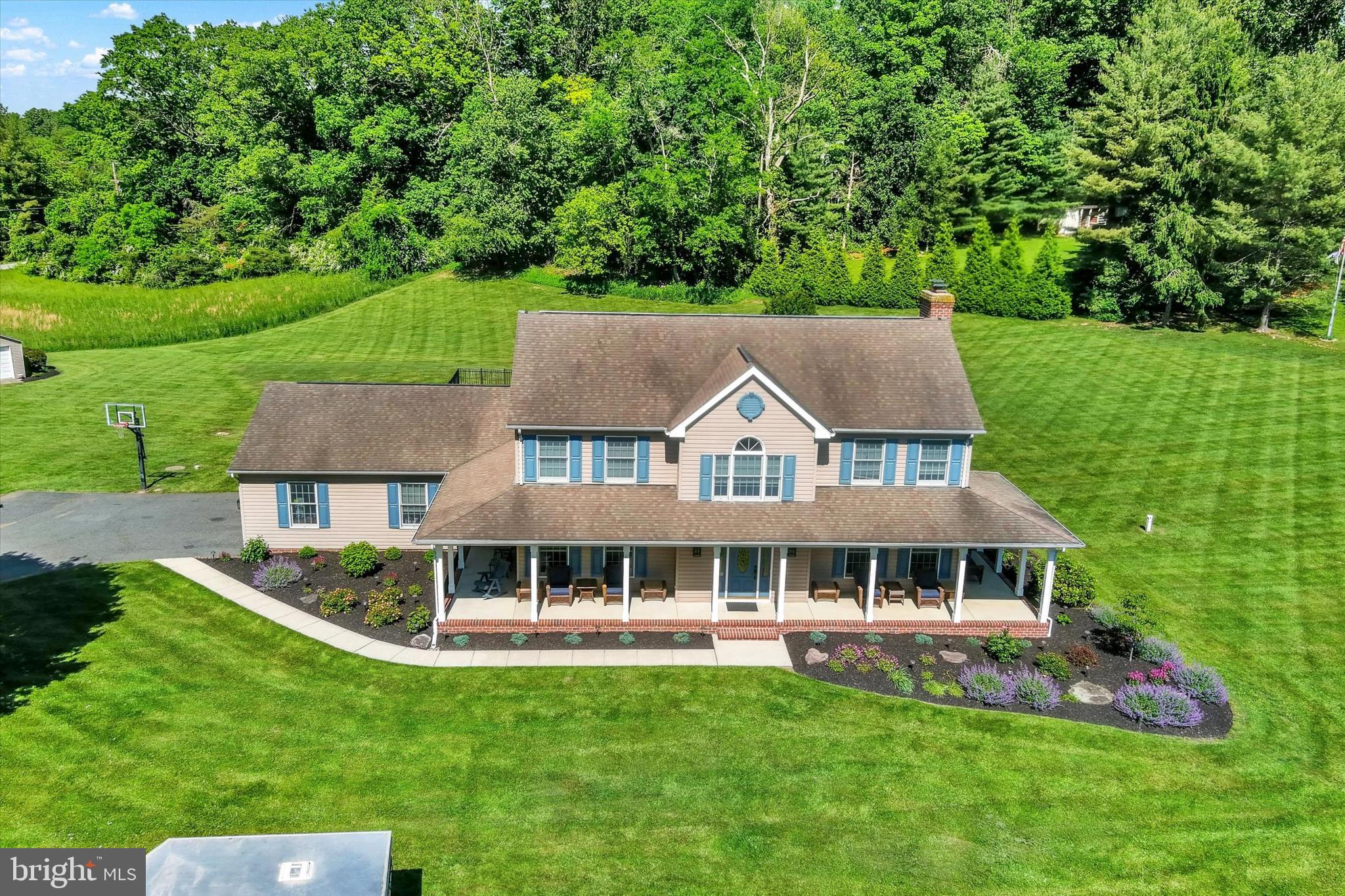 1014 Bernoudy Road White Hall, MD 21161 - Photo 58 of 73 front view of house with a garden