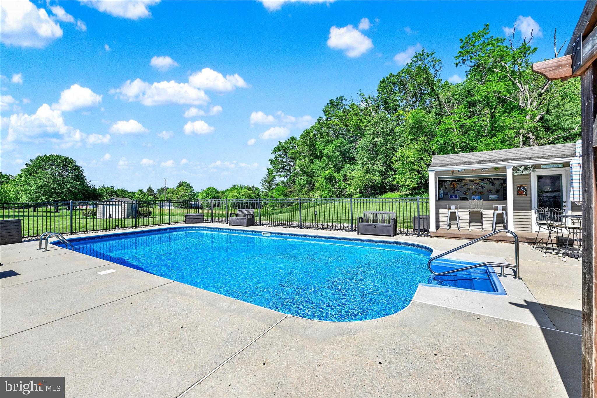 1014 Bernoudy Road White Hall, MD 21161 - Photo 7 of 73 a view of a swimming pool with lounge chair