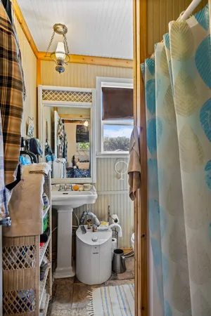 a view of house with a yard