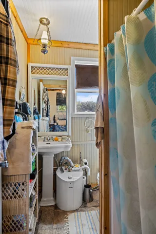 a view of house with a yard