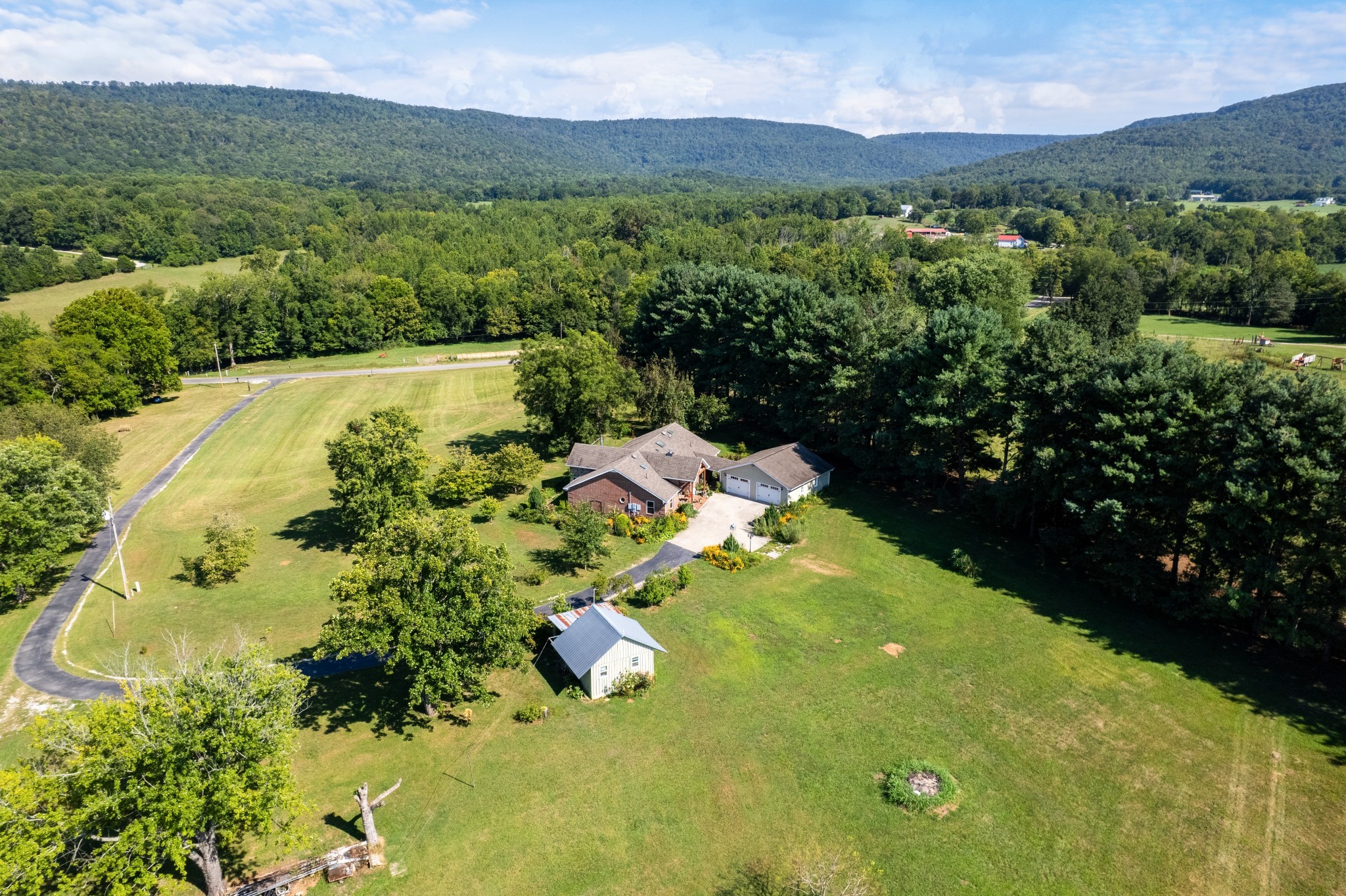 1556 Chestnut Grove Road Morrison, TN 37357 - Photo 45 of 57 a view of a lake with a mountain in the background