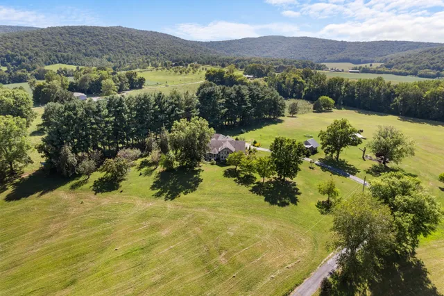 a view of a swimming pool with a mountain view