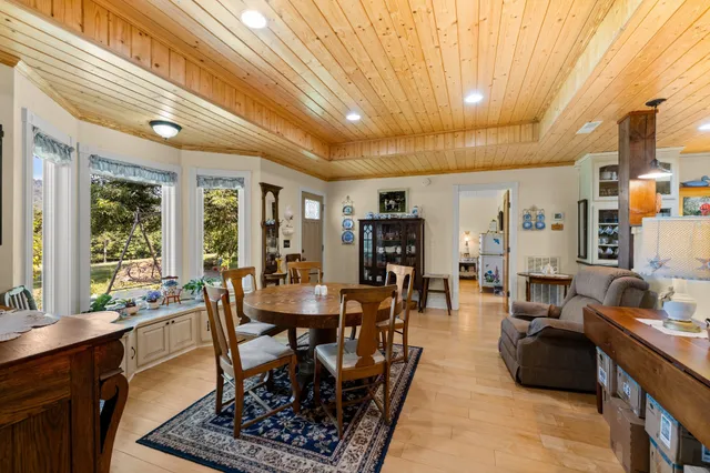 a large room with lots of furniture and appliances