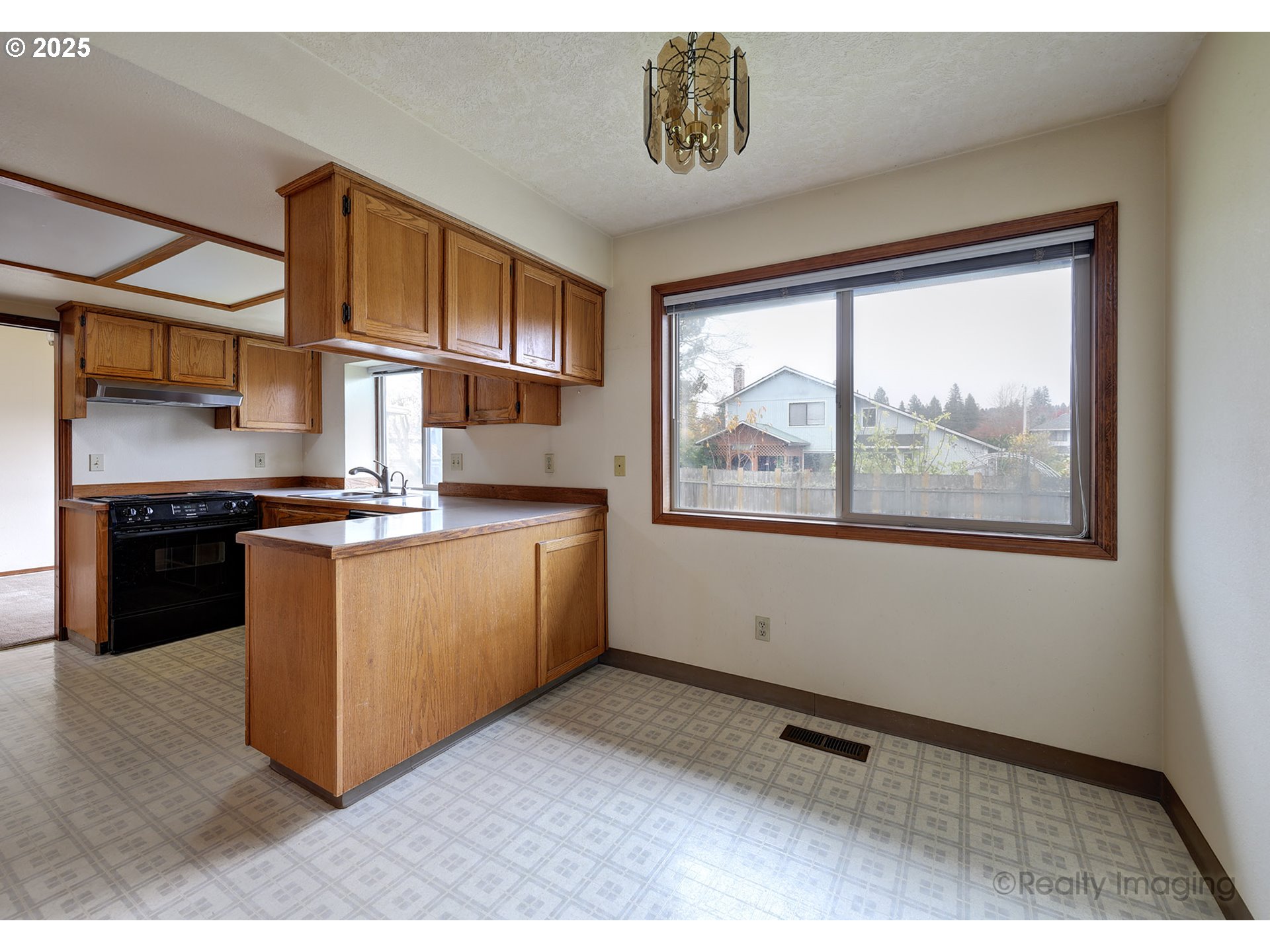 3756 Southwest 7th Court Gresham, OR 97030 - Photo 11 of 29 a kitchen with stainless steel appliances granite countertop a stove a sink and a refrigerator