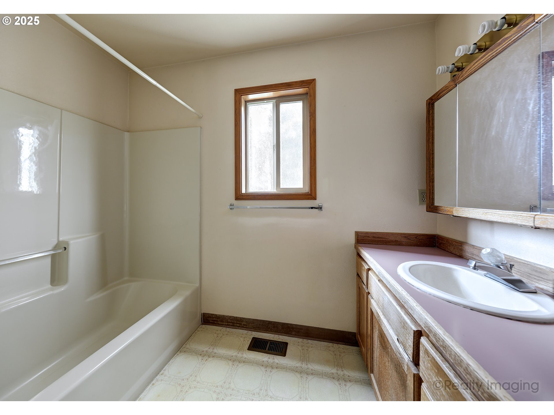 3756 Southwest 7th Court Gresham, OR 97030 - Photo 13 of 29 a bathroom with a sink a vanity and a bathtub