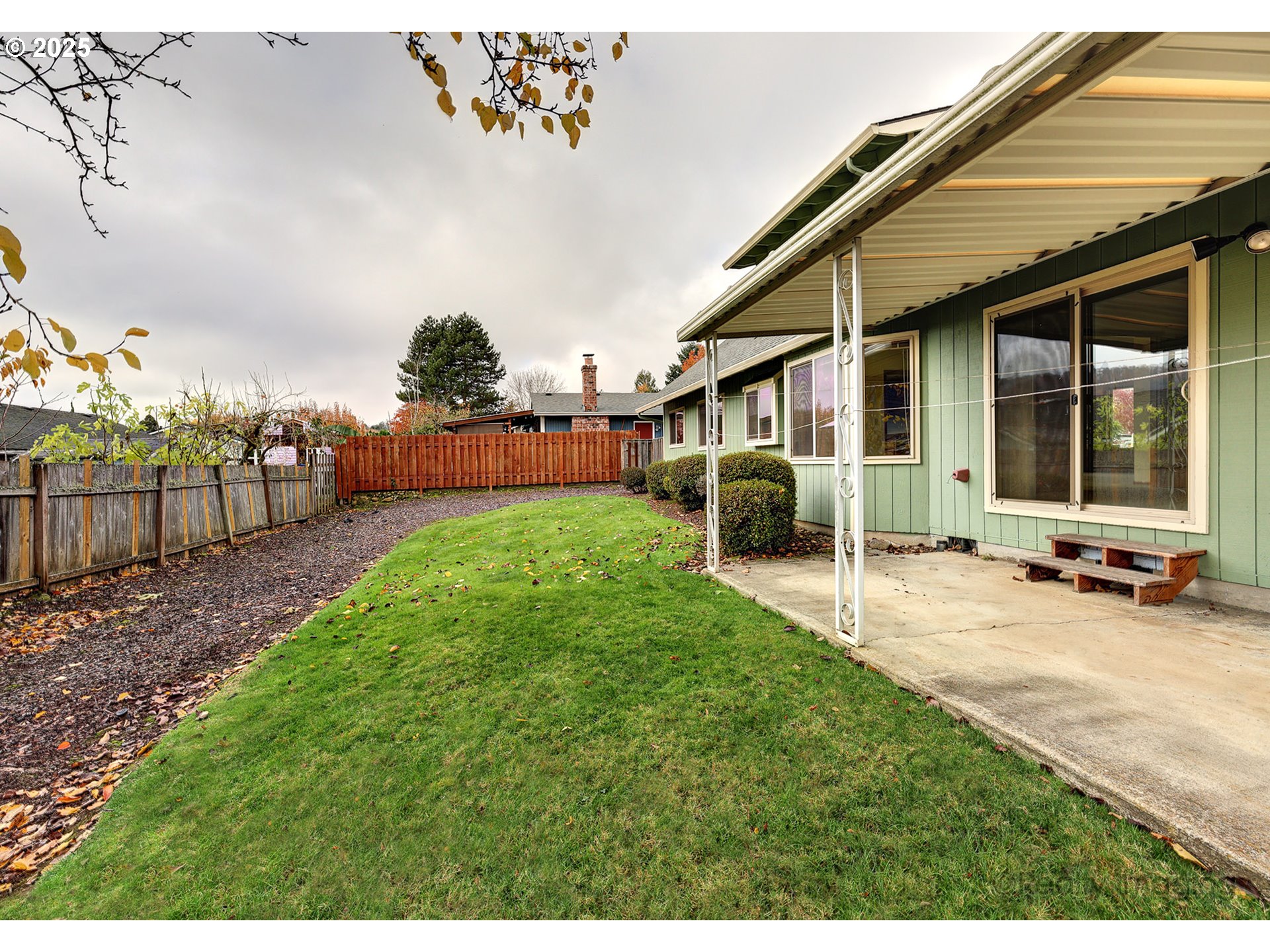 3756 Southwest 7th Court Gresham, OR 97030 - Photo 23 of 29 a view of a house with a yard and sitting area