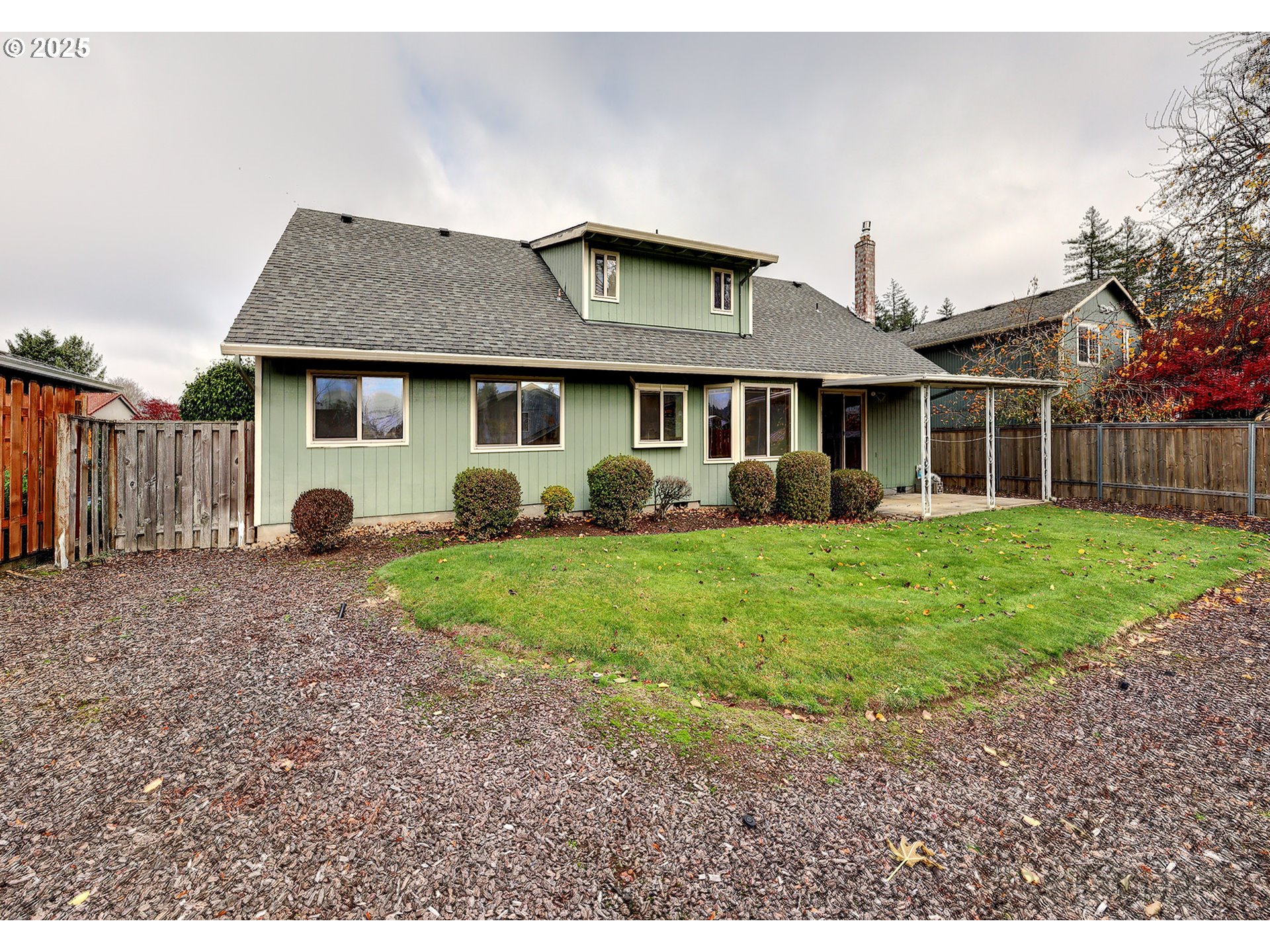 3756 Southwest 7th Court Gresham, OR 97030 - Photo 24 of 29 a view of a house with a backyard