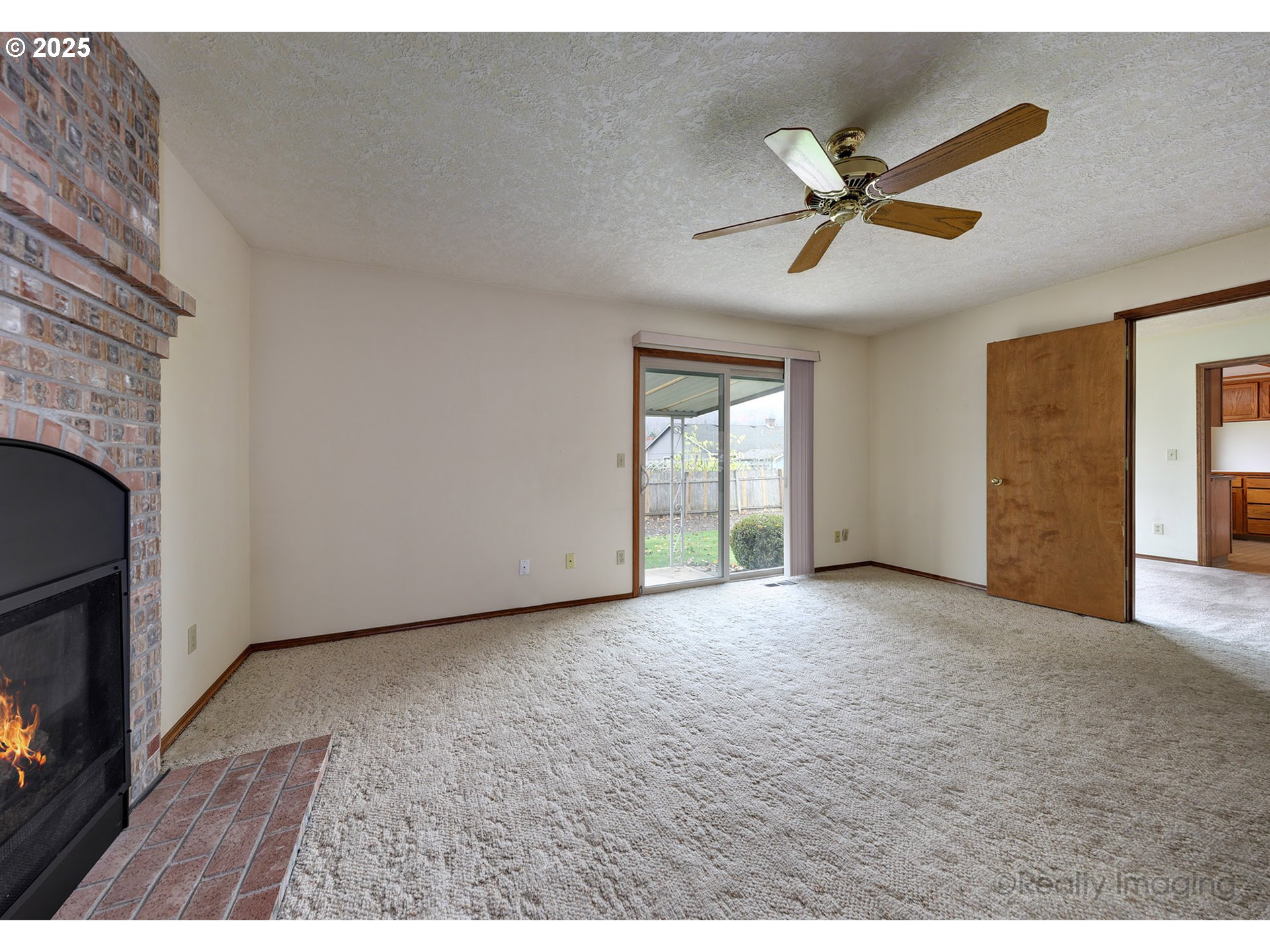 3756 Southwest 7th Court Gresham, OR 97030 - Photo 7 of 29 a view of a livingroom with a ceiling fan and window