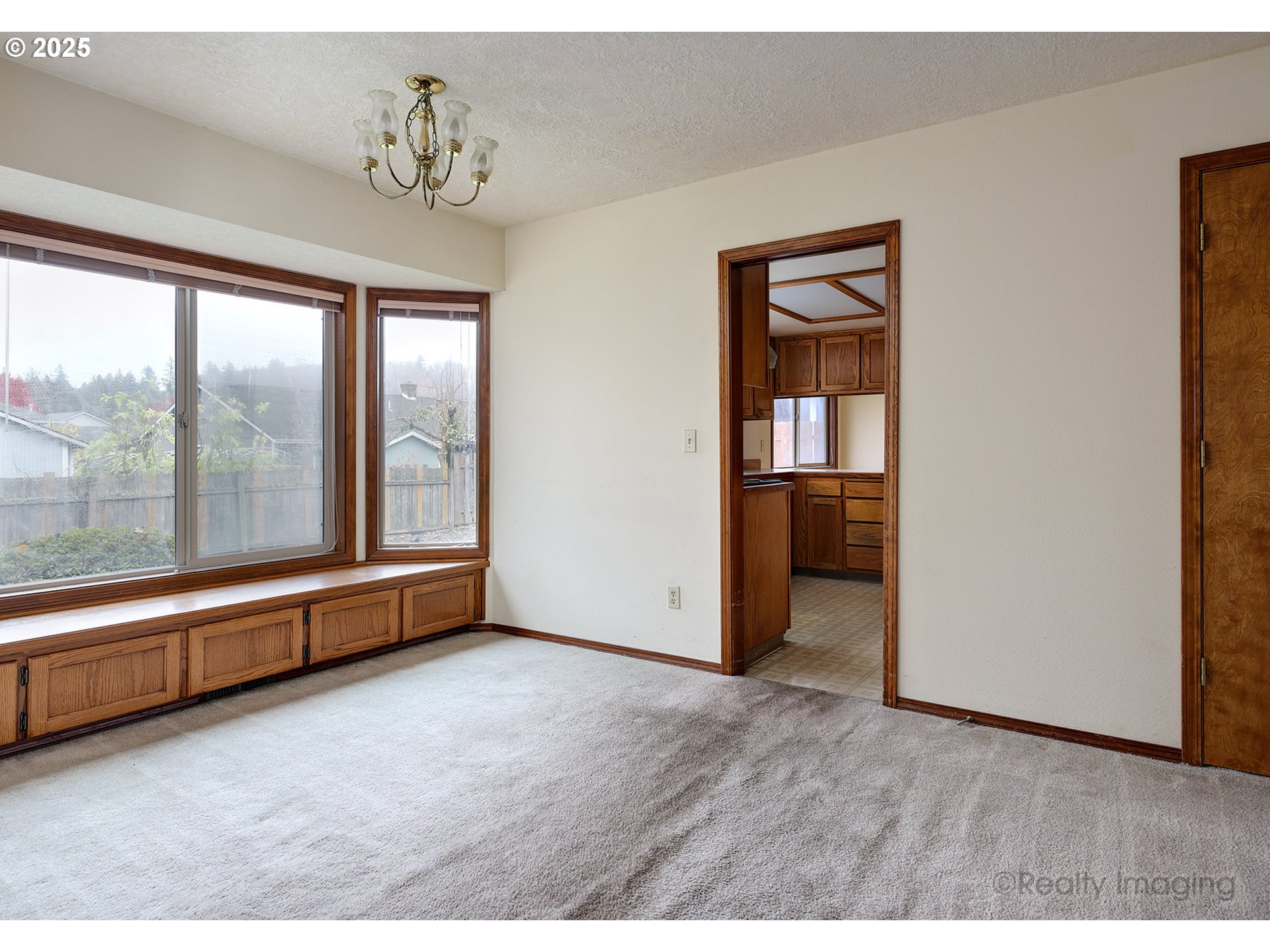 3756 Southwest 7th Court Gresham, OR 97030 - Photo 8 of 29 a view of an empty room with a window