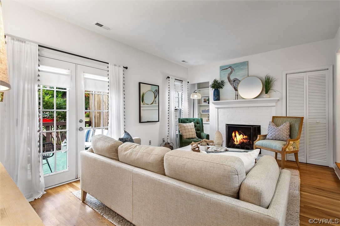 2734 Berkeley Pointe Drive Richmond, VA 23233 - Photo 15 of 31 a living room with furniture and a fireplace