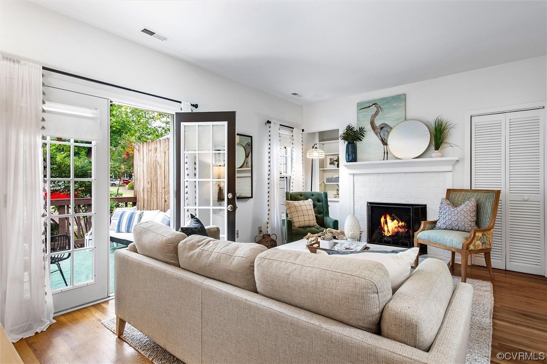 2734 Berkeley Pointe Drive Richmond, VA 23233 - Photo 16 of 31 a living room with furniture and a fireplace