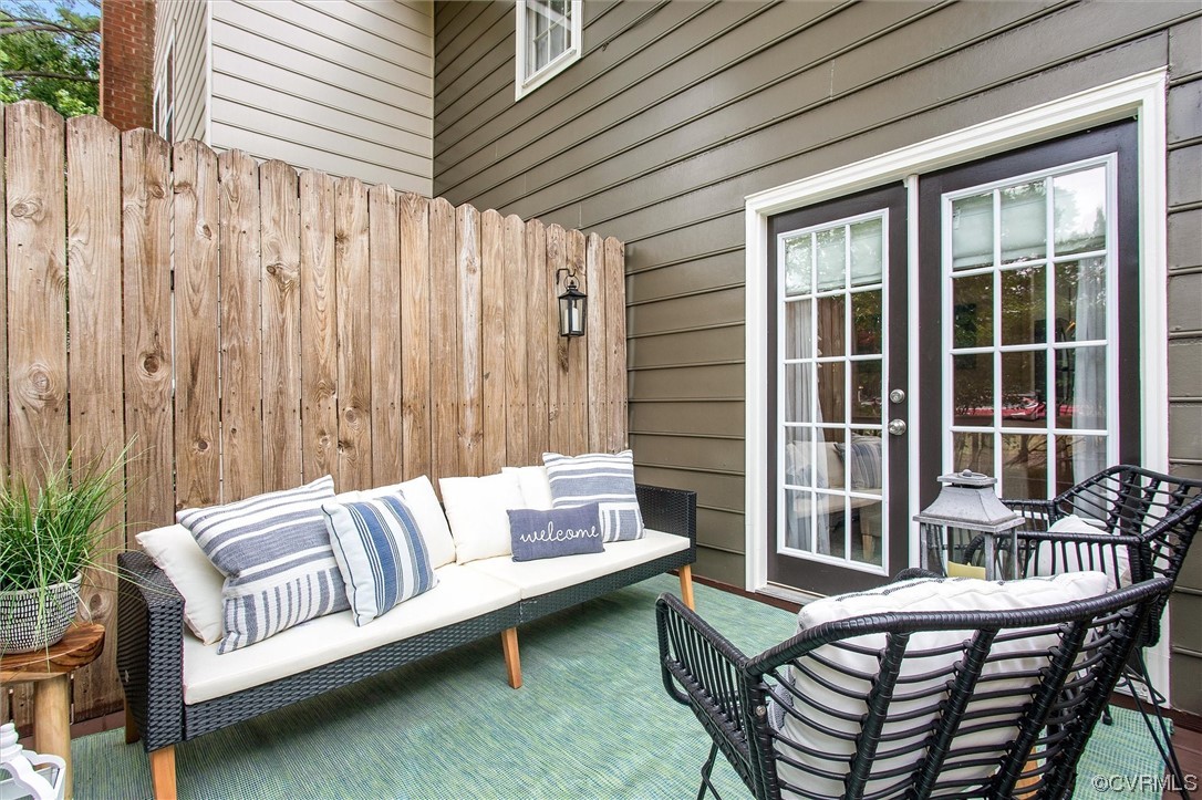 2734 Berkeley Pointe Drive Richmond, VA 23233 - Photo 18 of 31 a balcony with furniture and a potted plant