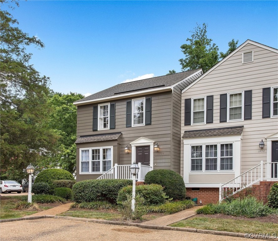 2734 Berkeley Pointe Drive Richmond, VA 23233 - Photo 2 of 31 a front view of a house with a yard