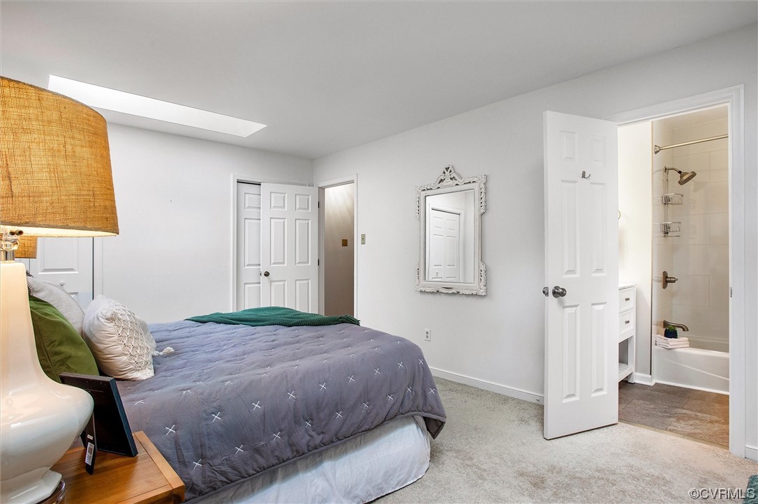 2734 Berkeley Pointe Drive Richmond, VA 23233 - Photo 21 of 31 a bedroom with a bed and a window