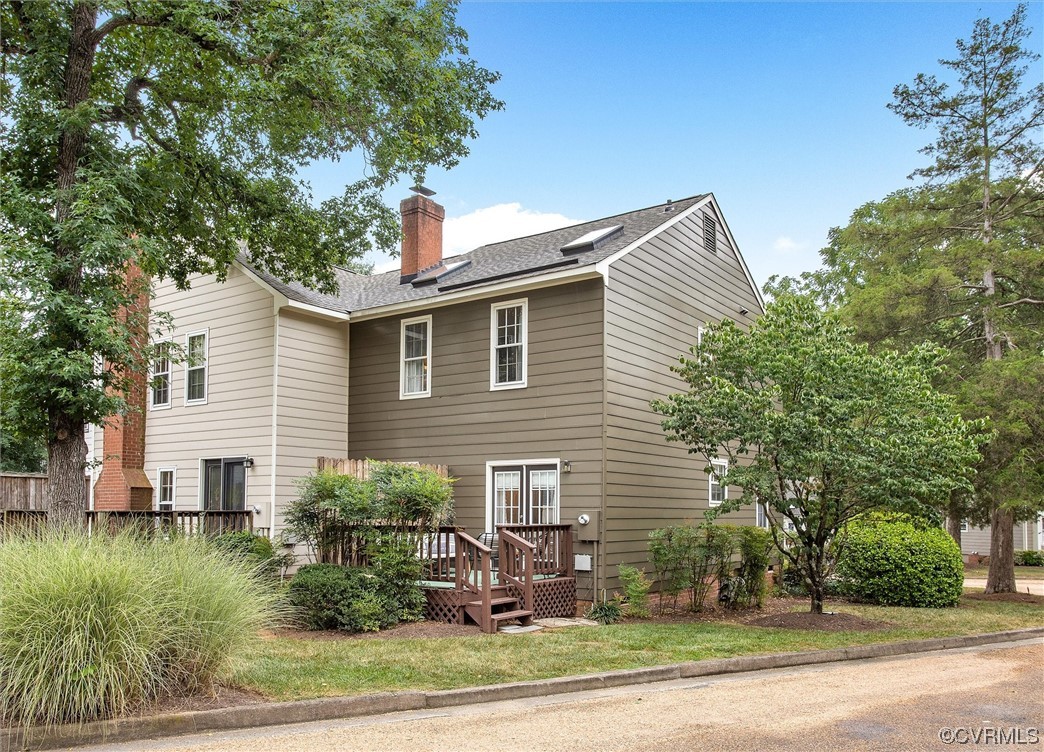 2734 Berkeley Pointe Drive Richmond, VA 23233 - Photo 27 of 31 a view of a house with a yard and plants