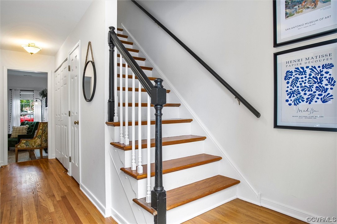 2734 Berkeley Pointe Drive Richmond, VA 23233 - Photo 4 of 31 a view of entryway with wooden floor and stairs