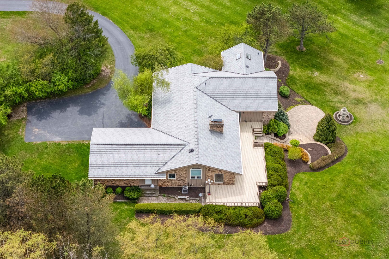 18620 McGuire Road Harvard, IL 60033 - Photo 33 of 40 a aerial view of a house with swimming pool and a yard