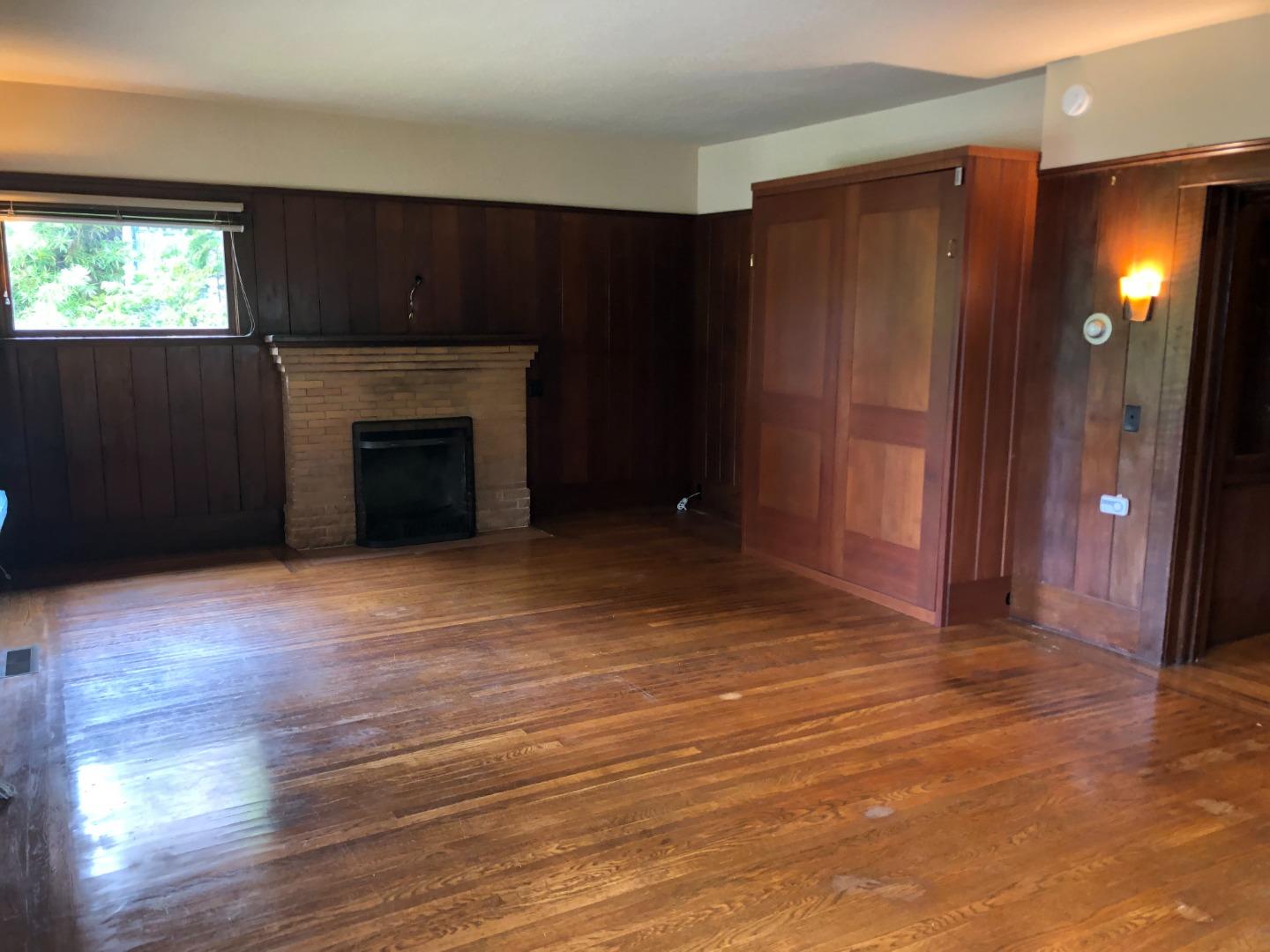 2629 Piedmont Avenue, Unit E Berkeley, CA 94704 - Photo 6 of 14 a view of a livingroom with a fireplace
