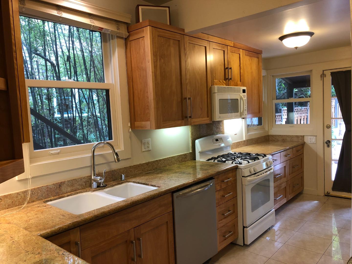 2629 Piedmont Avenue, Unit E Berkeley, CA 94704 - Photo 9 of 14 a kitchen with a stove and a sink