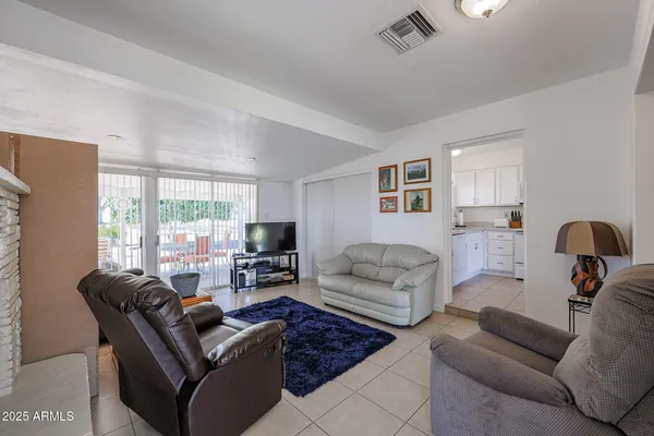 a living room with furniture or couch and a window