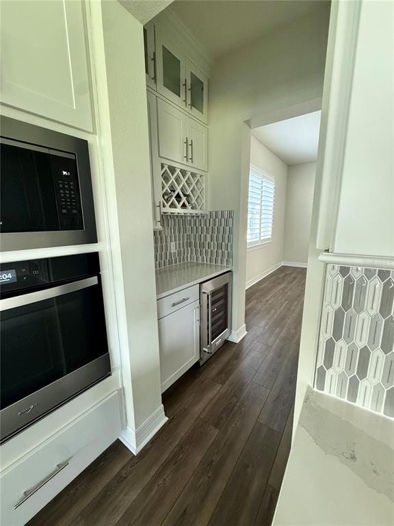 8441 Pk Clf Way Orlando, FL 32836 - Photo 13 of 59 a kitchen with granite countertop a stove and a refrigerator