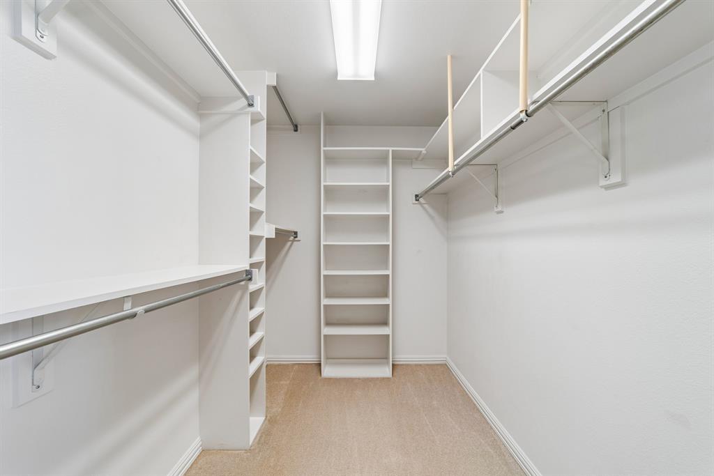 1175 Bloom Street Lucas, TX 75002 - Photo 18 of 36 a view of walk in closet with empty racks