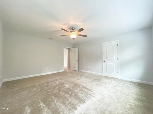 a bathroom with a double vanity sink mirror and double