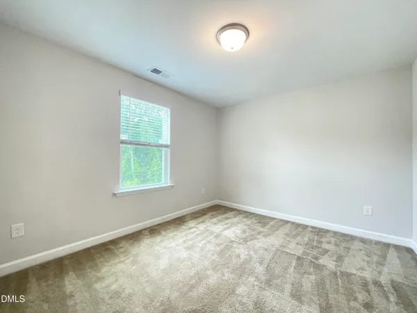an empty room with an entryway