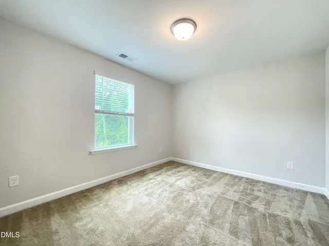 an empty room with an entryway