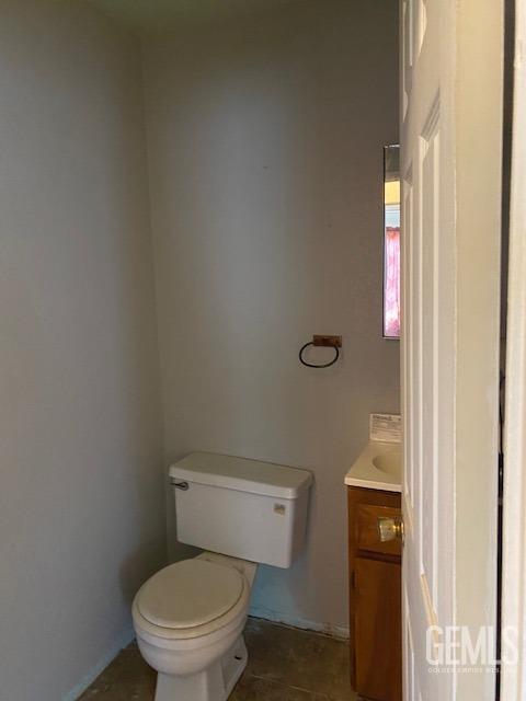 Undisclosed Address Bakersfield, CA 93307 - Photo 4 of 9 a white toilet sitting next to a shower