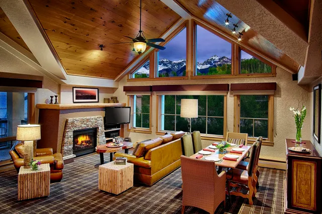 a outdoor living space with patio furniture and a fireplace