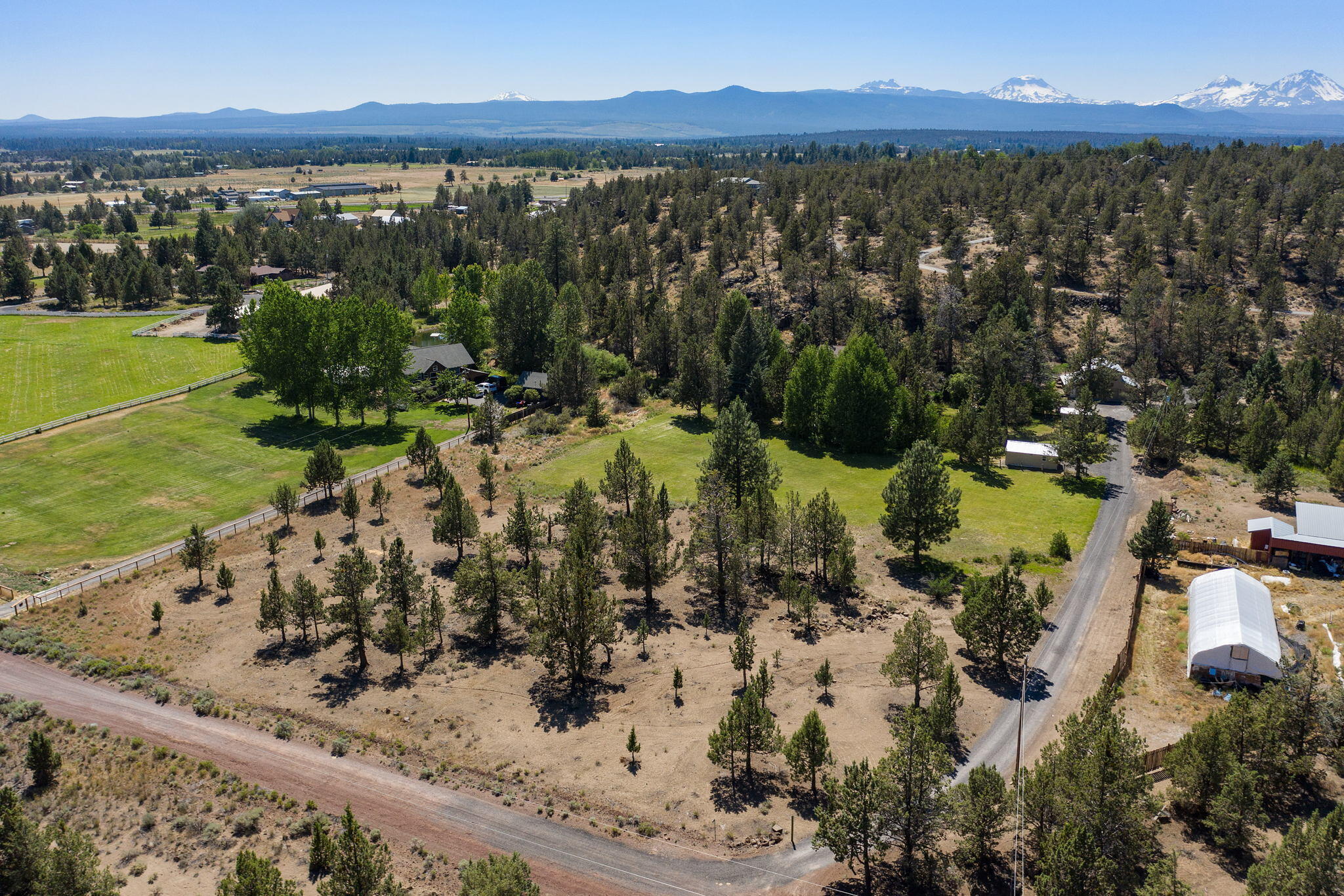 65161 Smokey Butte Road Bend, OR 97703 - Photo 45 of 45 a view of a yard with a lake view