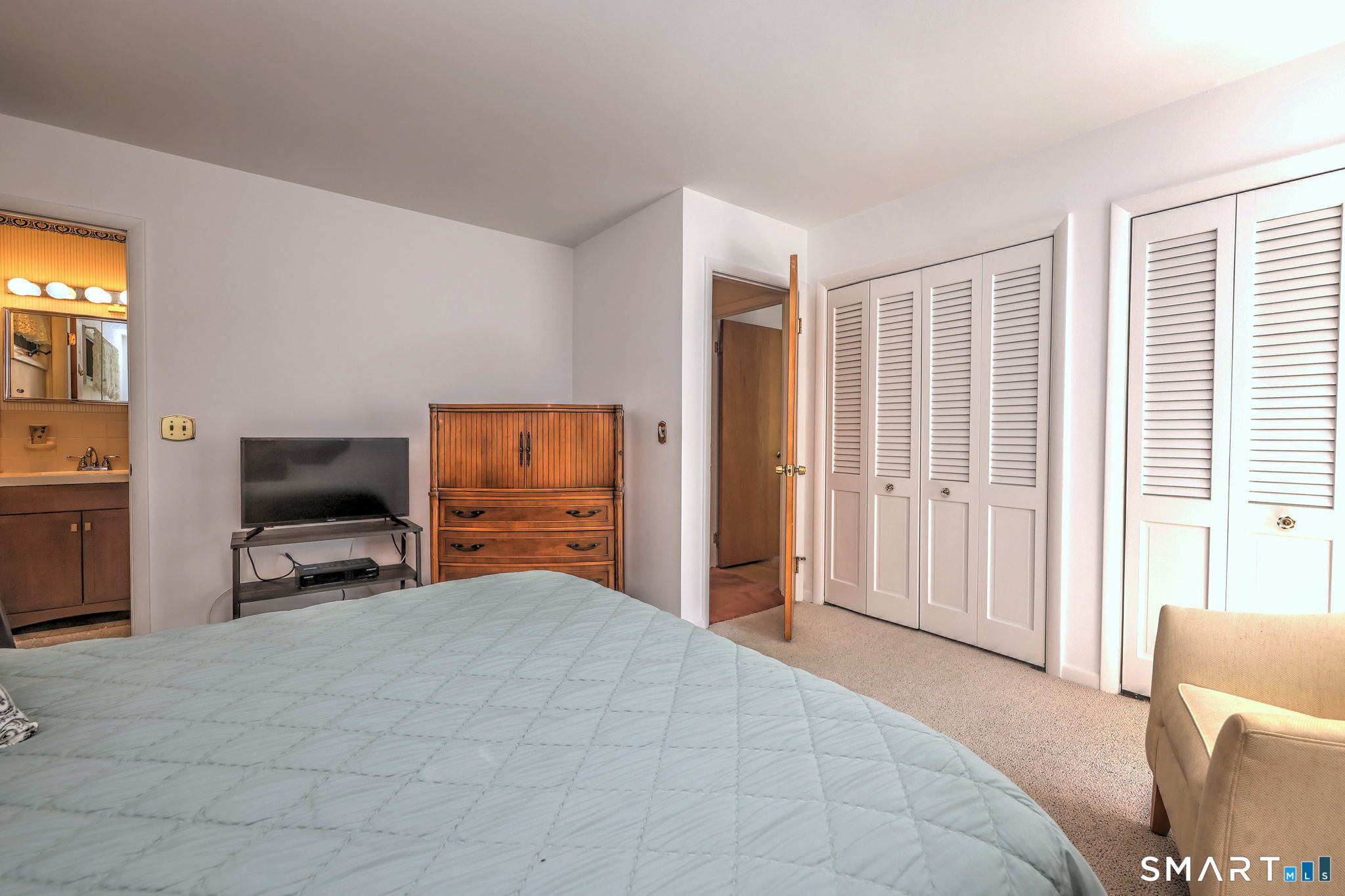8 Mayflower Road Norwalk, CT 06850 - Photo 13 of 20 Primary with the ensuite, plenty of closet space for all.