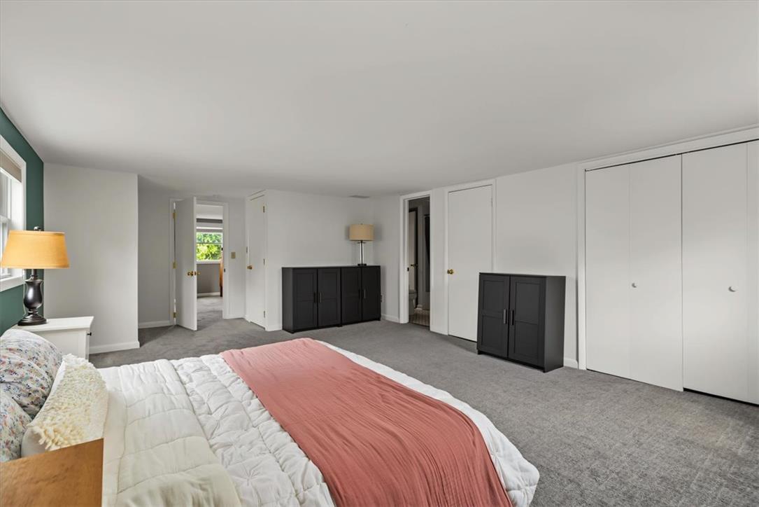303 Cedar Road Hellertown, PA 18055 - Photo 14 of 27 A spacious sleeping area offers ample storage and plush carpeting.
