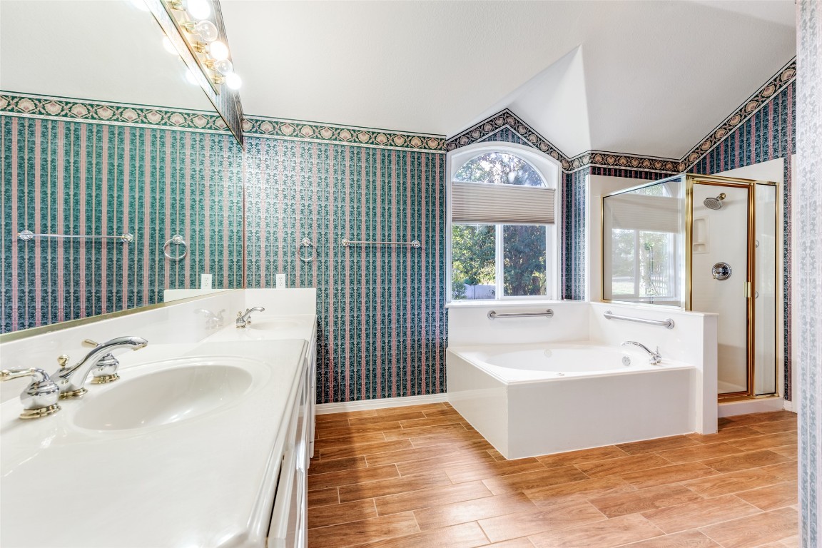 6901 Bright Star Lane Austin, TX 78736 - Photo 17 of 24 a bathroom with a bathtub and a sink