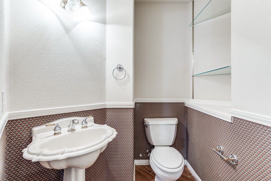 6901 Bright Star Lane Austin, TX 78736 - Photo 21 of 24 a bathroom with a sink toilet and a mirror