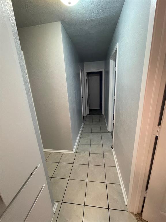738 East Oates Road Garland, TX 75043 - Photo 17 of 19 a view of a hallway