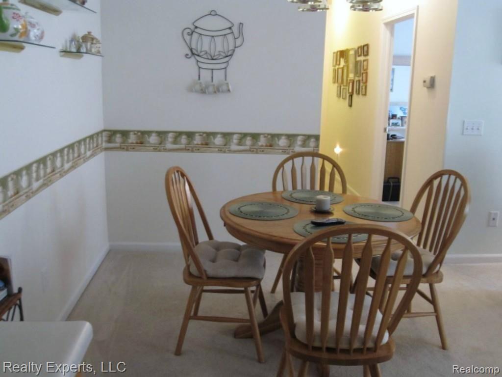 528 Olde English Circle Howell, MI 48855 - Photo 8 of 22 DINING ROOM