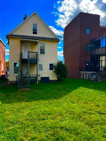 a front view of house with yard