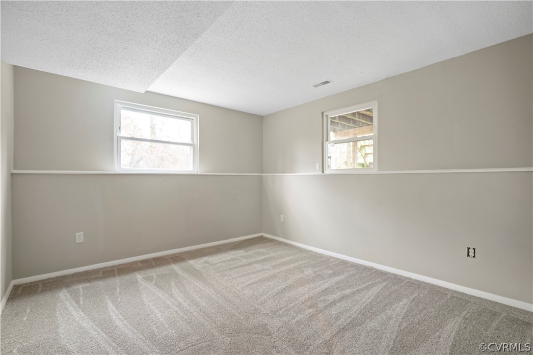 4201 Wistar Road Henrico, VA 23228 - Photo 19 of 30 an empty room with a window