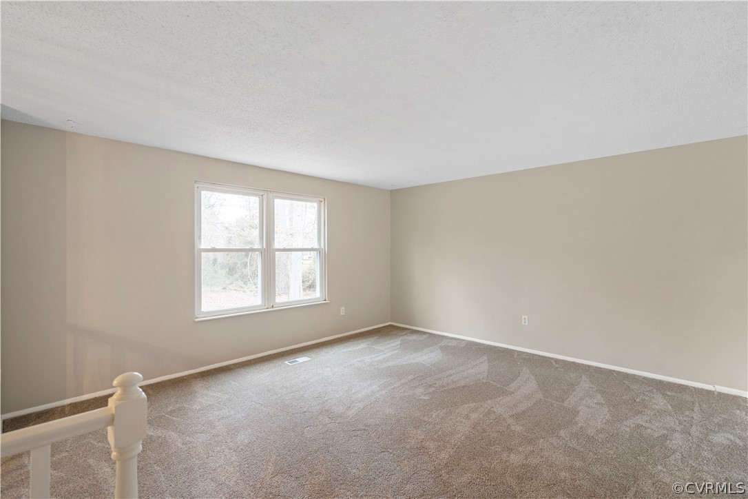 4201 Wistar Road Henrico, VA 23228 - Photo 8 of 30 an empty room with a window