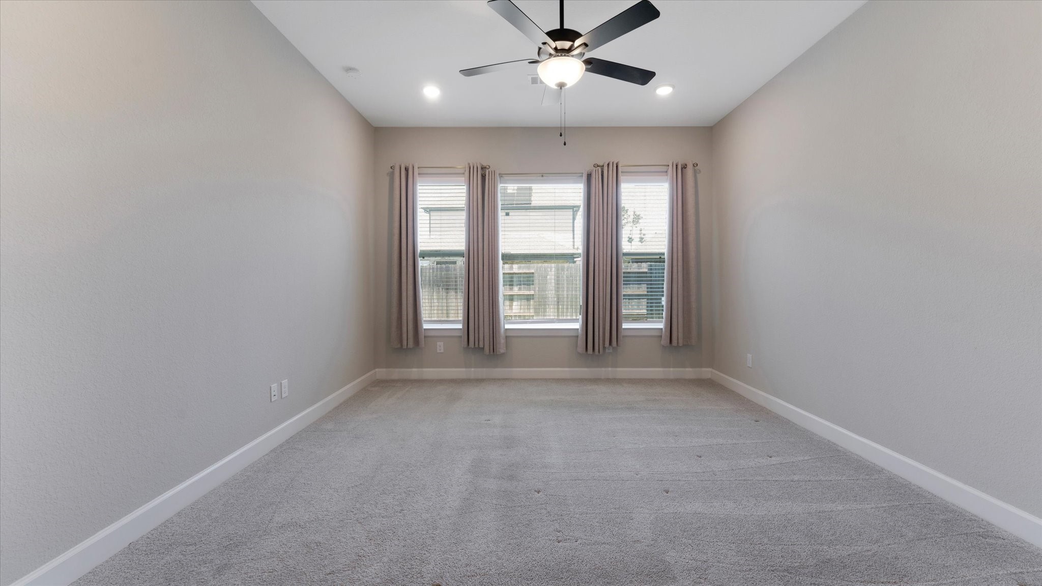 15607 Rising Wren Court Conroe, TX 77302 - Photo 20 of 40 wooden floor in an empty room with a window